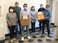 La consegna dei pacchi contenenti le “borse della spesa” confezionate dal Rotary Club Canelli-Nizza Monferrato ad alcuni responsabili dei Comuni