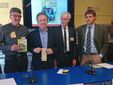 Simone Grappiolo, l'ass. regionale all'Agricoltura Giorgio Ferrero, Roberto Chialva e Tiziano Valperga (rispettivamente presidente e direttore Arap) ritratti al termine della presentazione torinese del marchio identificativo
