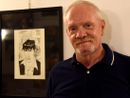 Luigi Piccatto in uno scatto che lo ritrae con una sua tavola realizzata per &quot;Dylan Dog&quot;