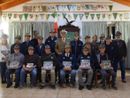 Alcuni alpini astigiani presenti alla presentazione del libro con il Tenente Colonnello Mario Renna. (ph. Daniele Piroso)