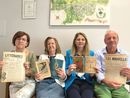 Nella foto, da sinistra a destra: Veglio, Gerbi Bordone, Macchia e Aubert Gambini con libri e riviste di Villa Saxer