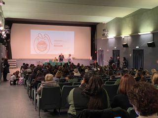 I protagonisti del Bagna Cauda Day 2023 in un gremito salone del Cinema Lumiere