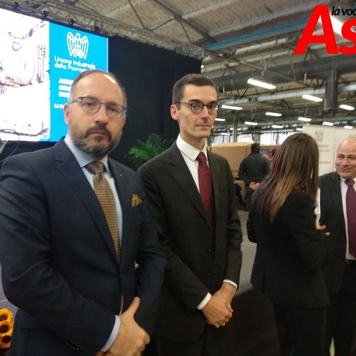 Sindaco di Asti e presidente della Provincia ritratti nel corso di un evento organizzato dall'Unione Industriale nel novembre 2019
