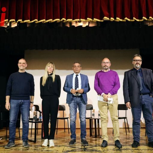 I sette candidati sindaci in un'immagine relativa un precedente confronto pubblico (ph. Efrem Zanchettin - Merfephoto)