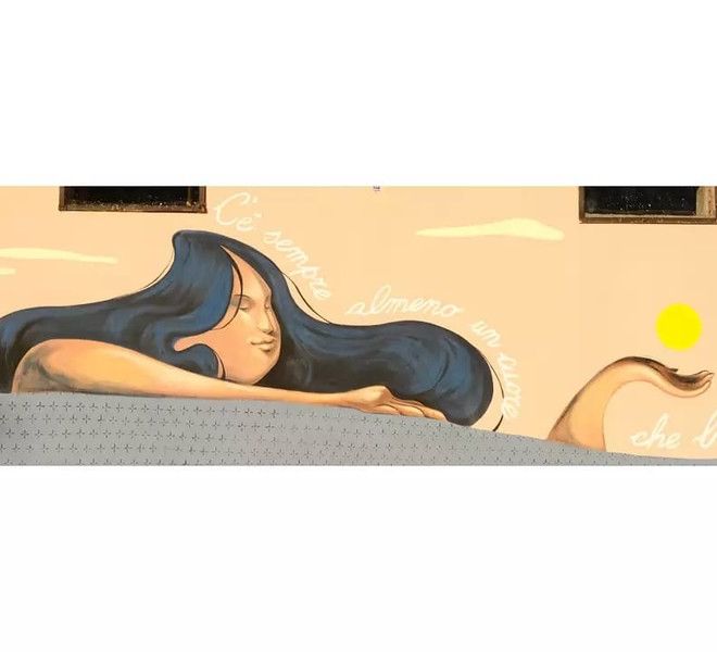 Il sole carico di metafore in un murales degli allievi del liceo artistico
