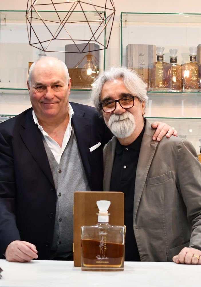 Chicco Berta, presidente delle Distillerie Berta, e il Maestro Peppe Vessicchio a Vinitaly 2024