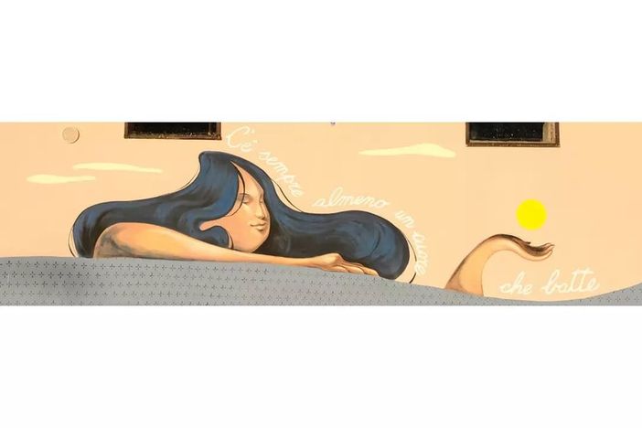 Il sole carico di metafore in un murales degli allievi del liceo artistico