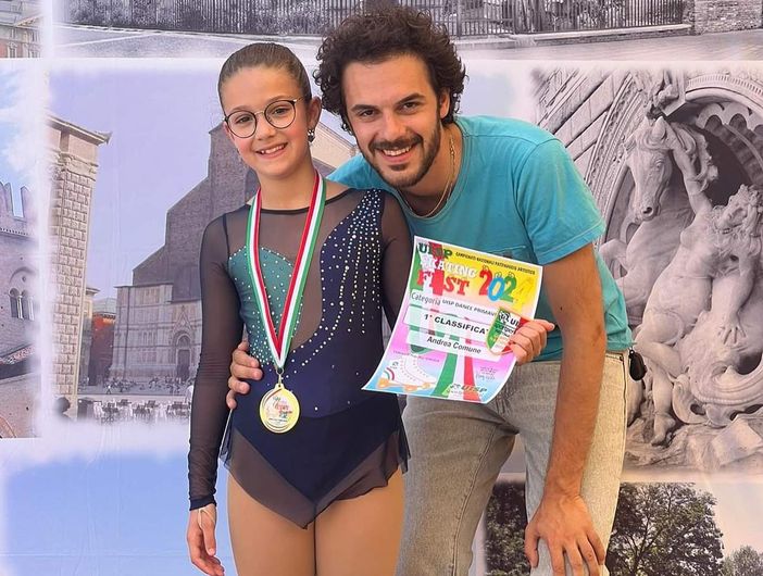 Il tecnico Federico Trento con la nuova Campionessa Nazionale categoria Dance Primavera Plus Andrea Comune Il tecnico Federico Trento con la nuova Campionessa Nazionale categoria Dance Primavera Plus Andrea Comune