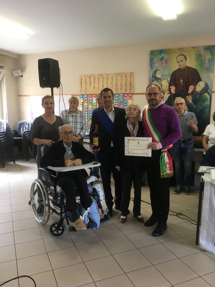 Dovilia Malandrone con suo marito Firmino Avidano, Maurizio Rasero e Marco Gabusi