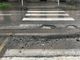 Alcune buche (ora chiuse) in viale Partigiani