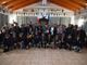 Alcuni alpini presenti alla serata con (al centro) il vescovo della diocesi di Asti, mons. Marco Prastaro e il presidente della Sezione ANA di Asti Fabrizio Pighin