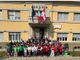 Isola d'Asti festeggia la Giornata dell'Unità Nazionale: storia, musica e una bandiera fatta di bambini