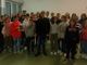 Studenti e studentesse della redazione con, al centro della foto, il giornalista Gabriele Massaro
