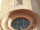 La statua di San Secondo sulla facciata della Collegiata di Asti