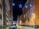 Le luminarie ancora accese in via Brofferio