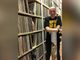 Massimo Cotto ritratto (da Paola Malfatto) con una parte della sua immensa collezione musicale