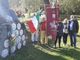 La delegazione dell’ANPI di Asti davanti al Cippo che ricorda l’eccidio di Melle