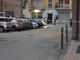 I rilievi dei carabinieri subito dopo la rapina. Sotto il telo, il corpo senza vita di uno dei rapinatori