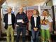 Un'immagine della consegna dei fondi all'associazione &quot;One More Life&quot;
