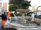 Gli operatori di Asp al lavoro per la riattivazione della fontana di piazza Marconi