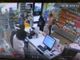 Un fermo immagine della rapina in farmacia
