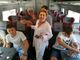 La presidente dell'Ordine dei Geometri, Donatella Curletto (al centro) con alcuni dei ragazzi premiati, ritratti sul treno con il quale stanno raggiungendo Roma in vista della premiazione in programma domani mattina