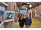 Laura Secci e Giulio Morra ritratti tra gli scatti in mostra