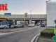 La coda, ieri, in corso Casale, per i lavori di asfaltatura davanti alla rotonda del centro commerciale &quot;Il Borgo&quot;