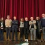 La presidente Luisa Amalberto con il regista Roberto Baracco, insieme a consiglieri, soci e al direttore della Fondazione Ezio Mosso.