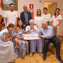 Un'immagine (ph. Merfephoto) della donazione assegno ai vertici del Massaia (al centro, in piedi, il direttore generale Asl AT Giovanni Gorgoni)