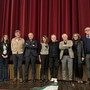 La presidente Luisa Amalberto con il regista Roberto Baracco, insieme a consiglieri, soci e al direttore della Fondazione Ezio Mosso.