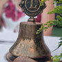 Campana e martelletto in accezione Lions
