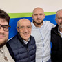 I vertici di Azione col direttore della Caritas albese don Domenico Degiorgis