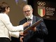 Nell'immagine (ph. Merfephoto - Efrem Zanchettin), Gianuzzi riceve dal questore di Asti Marina di Donato l’onorificenza della Stella Al Merito Sportivo durante la serata dei Premi Coni 2024