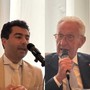 Beppe Ghisolfi a Porto Maurizio, Imperia con il moderatore e dirigente bancario Raffaele Giannone