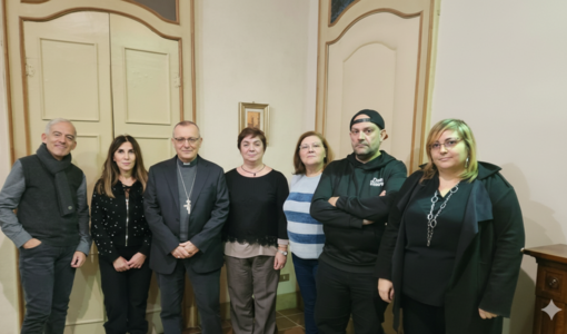 Monsignor Prastaro con le RSU Konecta