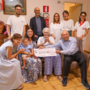 Un'immagine (ph. Merfephoto) della donazione assegno ai vertici del Massaia (al centro, in piedi, il direttore generale Asl AT Giovanni Gorgoni)