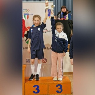 Nicole Scarzello Piumatti (a sinistra) sul podio