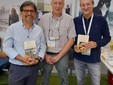 Al centro Mauro Baima, con gli autori Antonio Falco e Adriano Francia