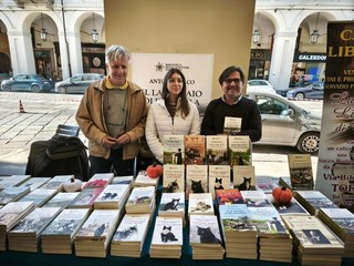 Mauro Baima con Arianna, la grafica e l'autore Antonio Falco a Portici di Carta a Torino