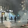 Milano, scontri e saccheggi. L'identikit dei violenti: giovanissimi, italiani e stranieri Milano, scontri e saccheggi. L'identikit dei violenti: giovanissimi, italiani e stranieri